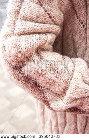 Young Beautiful Woman In A Cozy Nude Cardigan Spends Time Outdoors. Close Up. Without Face, Noface