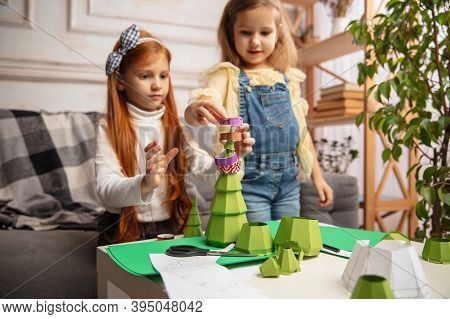 Art. Two Little Children, Girls Together In Creativity Of The House. Happy Kids Make Handmade Toys F