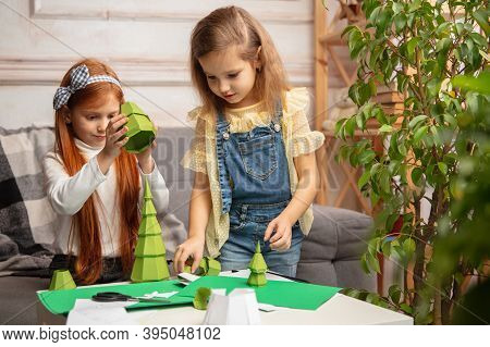 Christmas Tree. Two Little Children, Girls Together In Creativity. Happy Kids Make Handmade Toys For