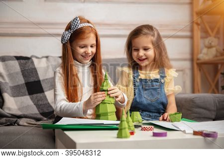 Cheerful. Two Little Children, Girls Together In Creativity Of The House. Happy Kids Make Handmade T