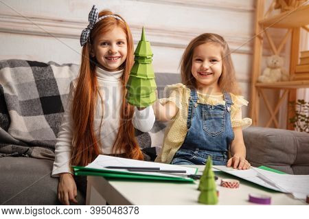 Gift. Two Little Children, Girls Together In Creativity Of The House. Happy Kids Make Handmade Toys 
