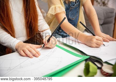 Close Up Hands Of Two Little Children, Girls Together In Creativity Of The House. Kids Make Handmade