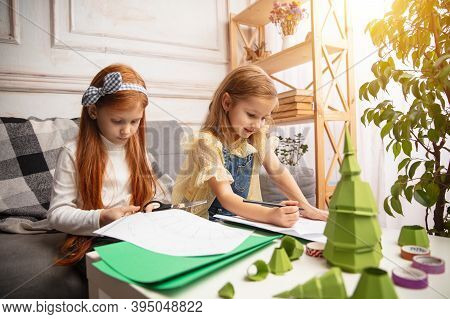 Artwork. Two Little Children, Girls Together In Creativity Of The House. Happy Kids Make Handmade To