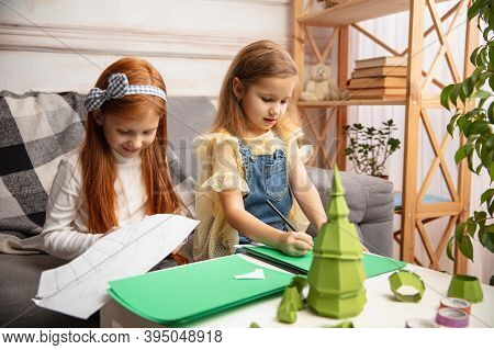 Artwork. Two Little Children, Girls Together In Creativity Of The House. Happy Kids Make Handmade To