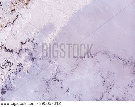 Amazing Forms Of Land Surface Made Of Water And Salt, Nature Abstract Background, Aerial View. Pink 
