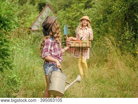 Loving Nature. Girls With Gardening Tools. Child Friendly Garden Tools Ensure Safety Of Child Garden