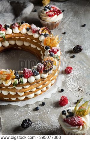 Round Pie With Berries On A Gray Background