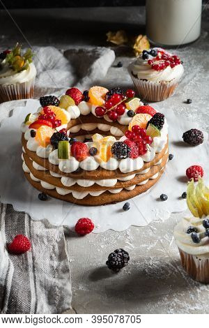 Round Pie With Berries On A Gray Background