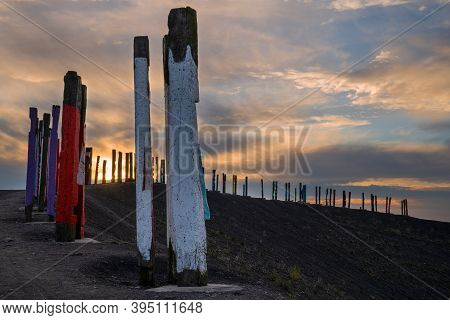 Bottrop, Germany - December 31, 2020: Totems On Haniel Tip, Landmark Of Ruhr Metropolis Against Rain