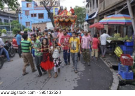 Blurred Image Of Young Bengali Hindu Devotees Dragging Holy Rope To Pull Rath, Chariot, Of God Jagan