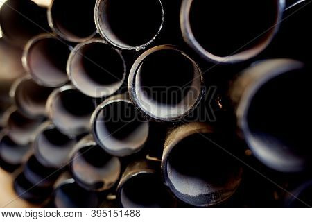 Black Metal Pipes And Adapters Of Different Diameters For Gasification Or Water Supply. Industrial B