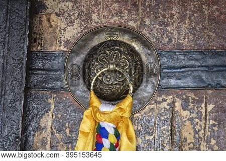 Door Handle Of Gate Door Of Gompa In Tibetan Buddhist Monastery. Ladakh, Jammu Kashmir, India . Clos