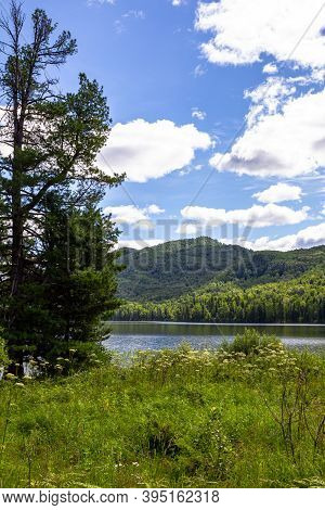 Cloudy Landscape At Lake Tagasuk. Siberia, Russia