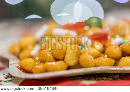 Homemade Sweet Italian Struffoli, Shortcrust Balls Fried And Dipped In Honey With Sprinkles. Typical