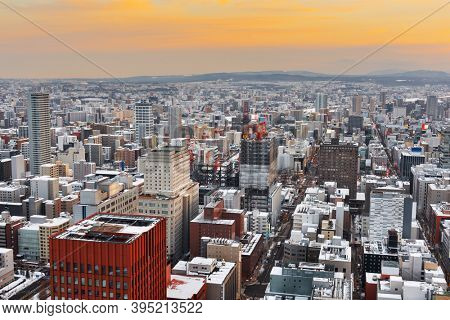 Sapporo, Hokkaido, Japan downtown skyline from above at twilight.