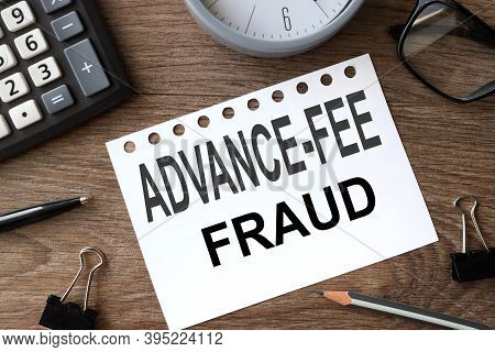 Advance-fee Fraud, Text On White Paper On Wooden Background