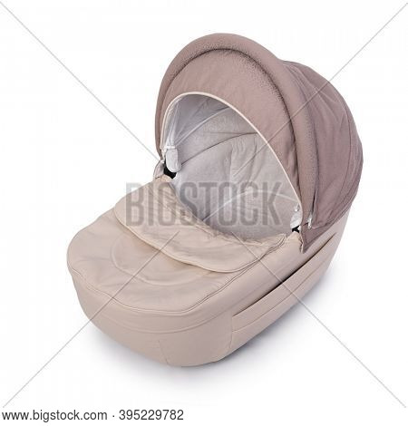 Beige carrycot stroller isolated over white background