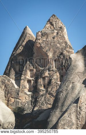Cave dwellings in stony mountains of Cappadocia, Turkey