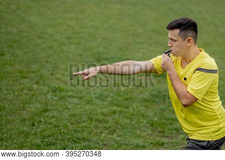 Referee Showing On Penalty While Gaming. Concept Of Sport, Rules Violation, Controversial Issues, Ob