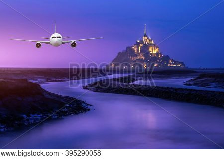 Real Airplane Over The Cityscpae With The View Of Mont Saint Michele, France
