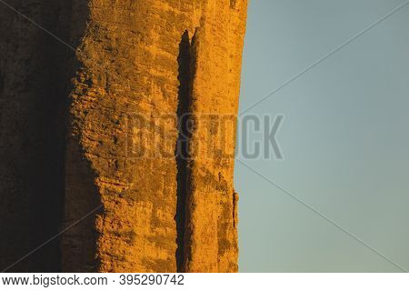 Mountains Of The Mallos De Riglos, Vertical Rock Walls At Sunset, A Famous Place For Climbing Near T