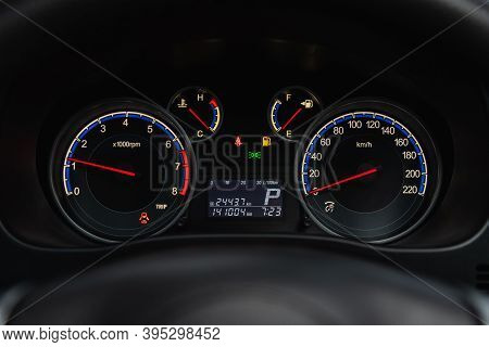 Novosibirsk, Russia - November 16, 2020: Suzuki X4, New Car Interior Details. Speedometer, Tachomete