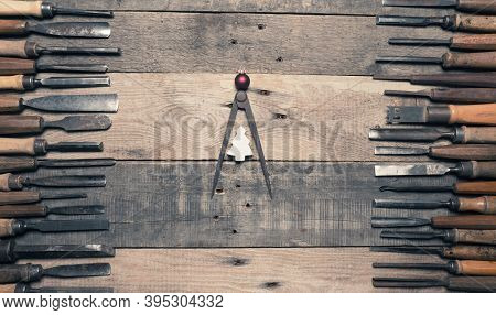 Many Firmer Chisels As Frame On A Rustic Workbench, A Steel Compass As Christmas Tree In The Middle!