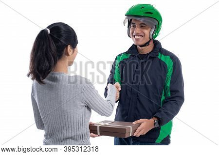 Delivery Courier With Helmet And Uniform Sending Package