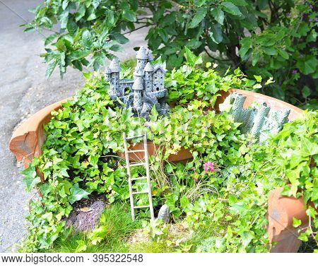 Miniature Fairy Tale Castle In Green Leaf Forest