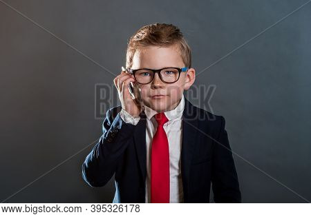 Portrait Of Confident Child Businessman With Phone In Hand. Leader. Back To School. Success, Creativ