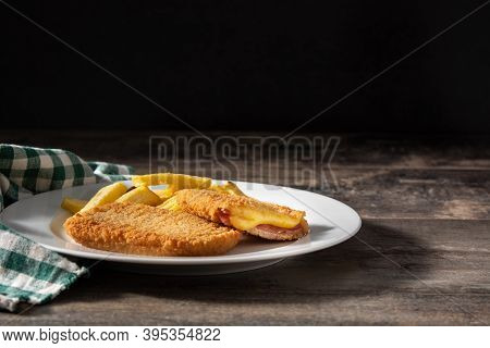 San Jacobo Steak Filled With Cheese And Ham On Black Background.copy Space