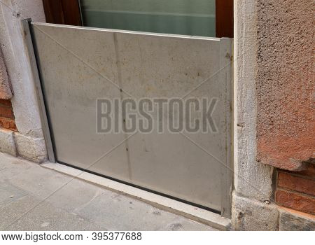 Sturdy Stainless Steel Gate To Protect The Entrance To The House From High Water During Floods