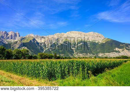 Panoramic View On Breche De Faraut Mountain Range In French Prealps In Summer