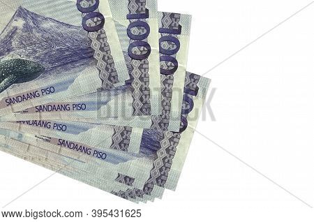 100 Philippine Piso Bills Lies In Small Bunch Or Pack Isolated On White. Mockup With Copy Space. Bus