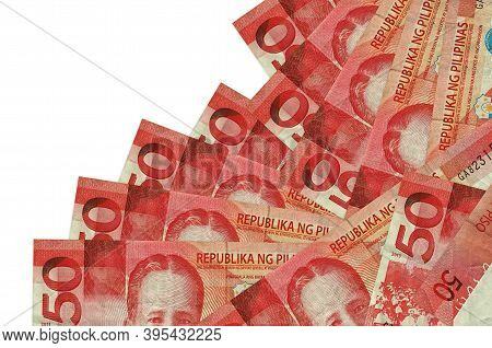 50 Philippine Piso Bills Lies In Different Order Isolated On White. Local Banking Or Money Making Co