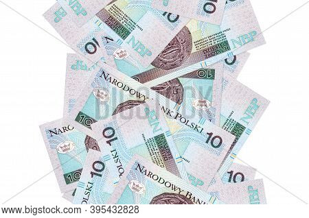 10 Polish Zloty Bills Flying Down Isolated On White. Many Banknotes Falling With White Copyspace On 