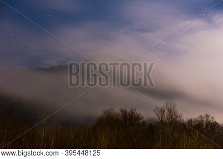 Beautiful Landscape With Cloudy Mountain At Twilight