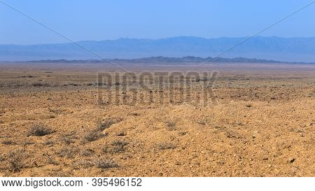 Steppe And Mountains In Almaty Region Of Kazakhstan