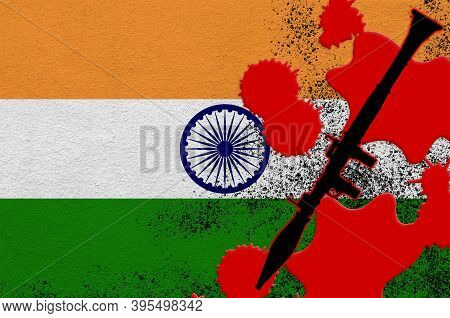 India Flag And Black Rpg-7 Rocket-propelled Grenade Launcher In Red Blood. Concept For Terror Attack