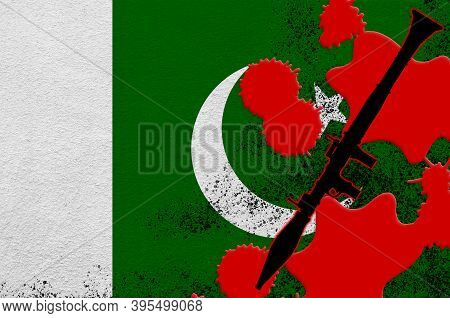 Pakistan Flag And Black Rpg-7 Rocket-propelled Grenade Launcher In Red Blood. Concept For Terror Att