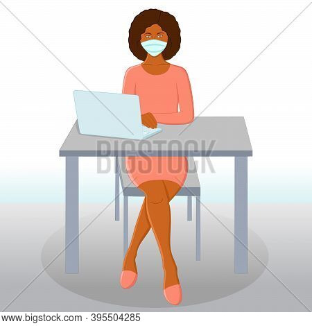Young Black Woman At Workplace Or Office Using A Laptop Working And Wearing Protective Face Mask Aga