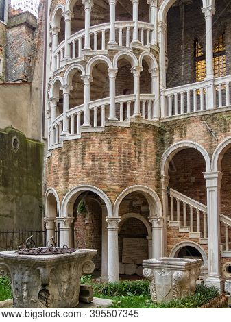 Venice, Veneto, Italy - November 24, 2016: The External Multi-arch Spiral Staircase Of Palazzo Conta