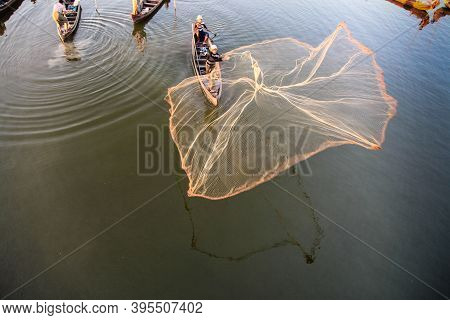Mandalay, Myanmar - Nov 12, 2019: Fishermen Near U Bein Bridge In Amarapura,mandalay Myanmar