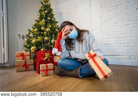 Sad Woman With Face Mask Home Alone At Christmas Missing Family And Friends