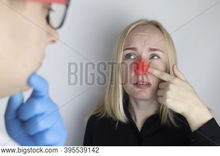A Young Woman Touches Her Nose, Which Is Very Painful. Medical Care Concept For Difficulty Breathing