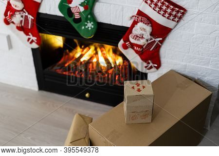 Kyiv, Ukraine - November 16, 2020: Boxes Nova Poshta With Delivery Of Christmas Gifts Lie Near The F