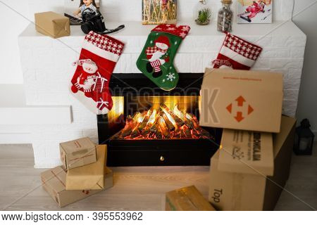 Kyiv, Ukraine - November 16, 2020: Boxes Nova Poshta With Delivery Of Christmas Gifts Lie Near The F