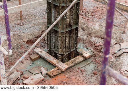 Column Formwork Internal Steel Structure Made Up Of Poles From The Ground. Column Timber Form Work A