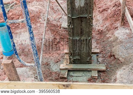 Column Formwork Internal Steel Structure Made Up Of Poles From The Ground. Column Timber Form Work A