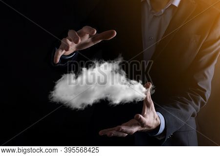 Businessman Hand Holding Cloud.cloud Computing Concept, Close Up Of Young Business Man With Cloud Ov